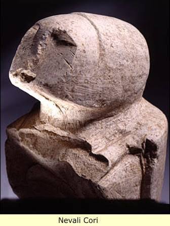 The 'bird-man' of Nevalı Çori: a limestone bust whose head is a bird of prey rather than a human face — one of the earliest known human-animal composite sculptures anywhere, from the site that produced the first T-pillars.