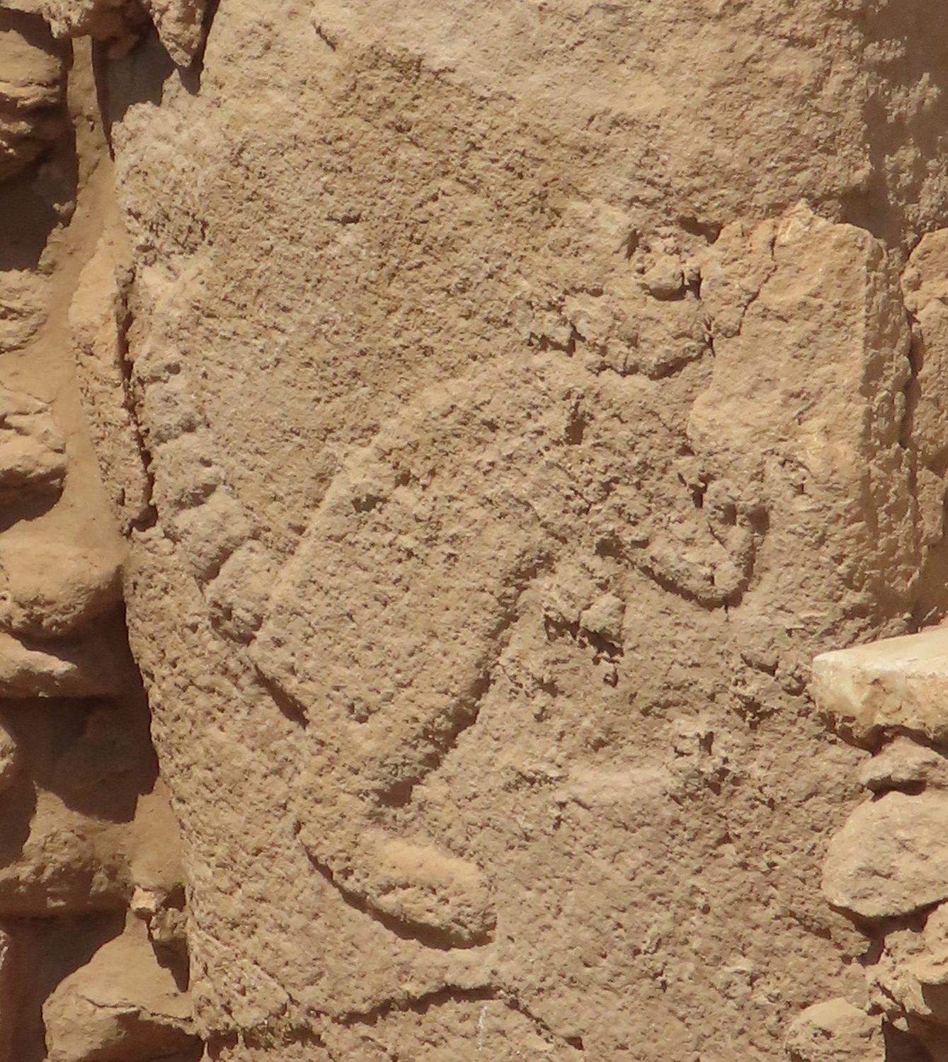 A fox carved in relief on a pillar in Karahan Tepe's Structure AD.