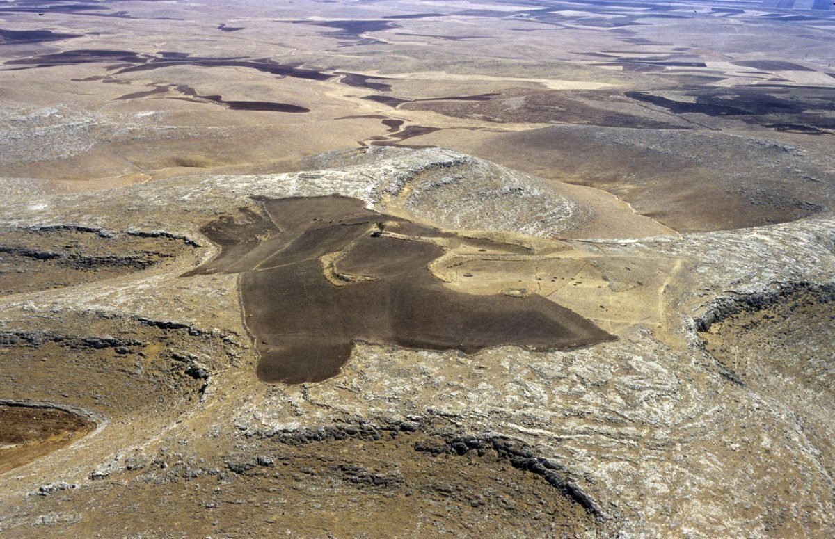 The bare limestone plateau at the highest point of the Germuş range — the raw-material source for Göbekli Tepe's pillars, and part of the protected site. The quarries lie a few hundred metres from the enclosures.