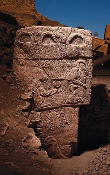 Pillar 43 at Göbekli Tepe, the 'Vulture Stone', seen from an angle in its enclosure